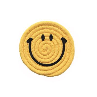 China 2135 Style Cotton Smile Face Place Mat Viable Nordic Handmade Rope Woven Coaster Insulation Pad for sale