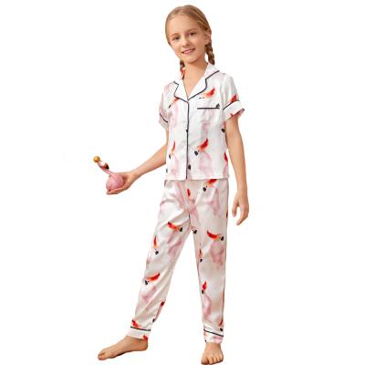 China QUICK DRY Short Sleeve Girls Sleepwear Satin Contrast Binding Parrot Print PJ Set Kids Pajamas for sale