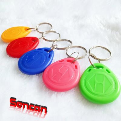 China Marin 125khz RFID EM Strictly Sealed Waterproof/Waterproof Rewritable Plastic Key Tag with Metal Ring for sale