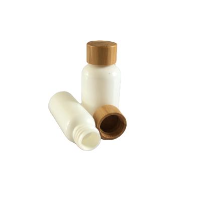 China Wholesale Eco-friendly Sugarcane 30ml Biodegradable PLA Lotion Round Shoulder Packaging Bottle With Bamboo Lid for sale