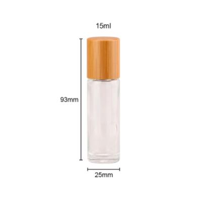 China Natural Clear Amber Color Bamboo Frosted Glass Roll On Bottle With Bamboo Lid Stainless Steel Ball for sale