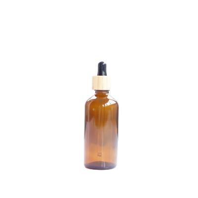 China Eco-friendly Eco-friendly Recyclable Essential Oil Glass Bottle With Bamboo Cover Dropper for sale