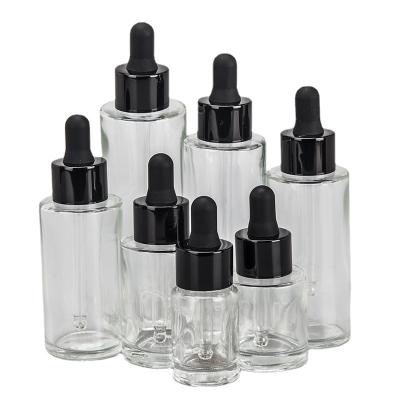 China Cosmetic in 10ml 20ml 30ml 50ml Common Clear Frosted Glass Flat Shoulder Essential Oil Dropper Bottle for Serum for sale