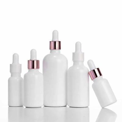 China Wholesale 10ml 15ml 20ml 30ml 50ml 100ml Essential Oil Cosmetic White Ceramic Glass Sample Portable Glass Bottle for sale