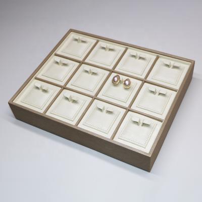 China Luxury Customized Beige Leather Wooden Earring Display Stand Jewelry Sets PU Tray And Storage Packaging for sale