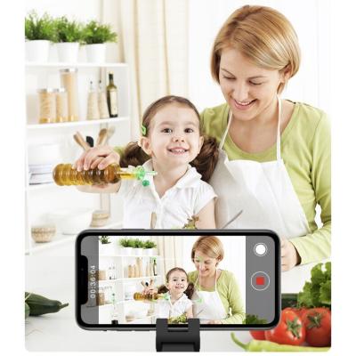 China Real face/object tracking & follow smart. Huayi hotsale face tracking smart object photo vlog cameraman mobile phone mounts 360 rotation robot cameraman phone holder for sale