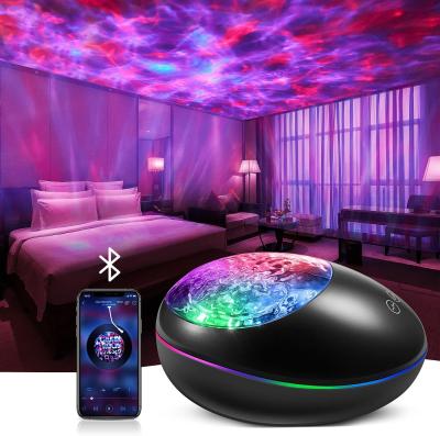 China Modern Built-in Speaker Led Surflight Projector Night Light Projector Music Player Project Adults Teen Room Lamp Remote Control for sale