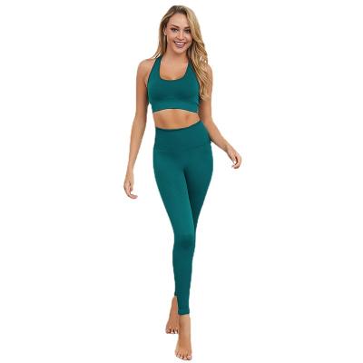 China European and American yoga suit women's yoga sports bra yoga fitness suit hip breathable knitted tight pants suit for sale