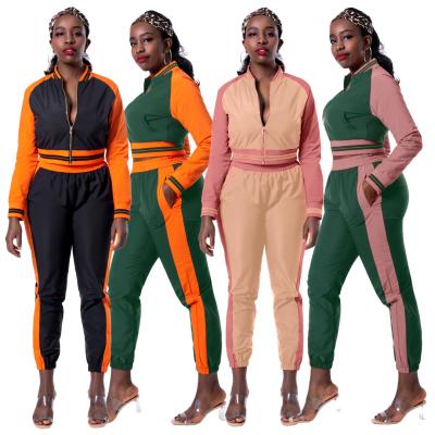 China Fashion Women's Anti-pilling Sports Clothes Patchwork Pockets Tops And Pencil Pants 2 Pieces Sets Ladies Tracksuits for sale