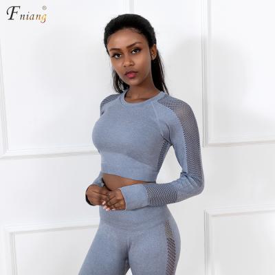 China 2021 Breathable Hollow Out Warm Crop Tops Breathable Long Sleeve Seamless Yoga Sets Stretchy Workout Leggings Yoga Pants for sale