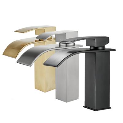 China Modern Stainless Steel Mixer Tap Deck Mounted Waterfall Bathroom Basin Faucet for sale