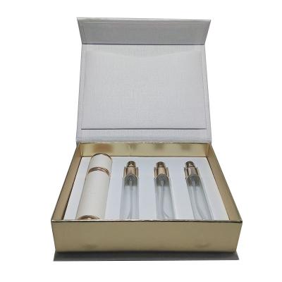 China Custom Wholesale Handmade Printed Vellum Paper Perfume Packaging Gift Box With EVA Foam Insert for sale