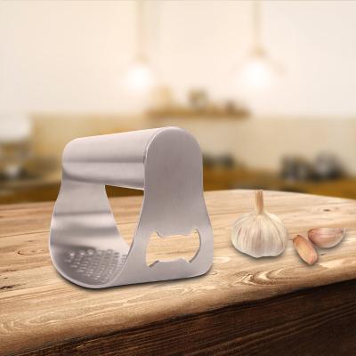 China Sustainable New Arrival Stainless Steel Manual Garlic Crusher Curved Garlic Machine for sale