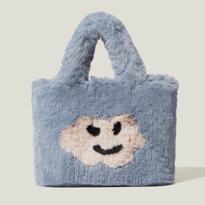 China Fashion New Women's Bag 2021 Handheld Cross Plush Soft Smiley Face Design Lovely Soft Winter Personality for sale