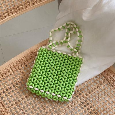 China Solid Color Diy Beaded Portable Square Handmade Beaded Hollow Material Female Handbag Bohemian Modern Minimalist Korean Bag for sale