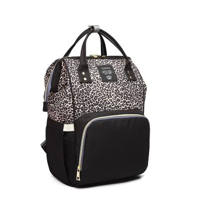 China Fashion PORTABLE Hot Selling Diaper Bag Large Capacity Diaper Bag Leopard Mom Baby Maternity Backpack for sale