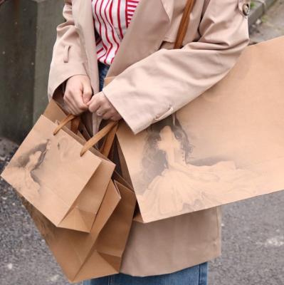 China Recyclable Custom Thick Tote Bags White Brown Paper Gift Wrapping Paper Handle Shopping Carrier Bag for sale