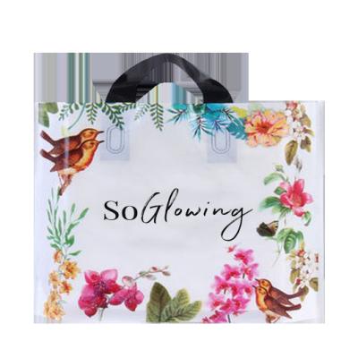 China Cheap Custom Moisture Proof Shopping Plastic Bags Small Carry Plastic Clothing Packaging Bags With Handle for sale