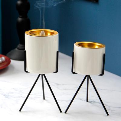 China Simple modern style home decoration Middle East Arabian gold metal iron ceramic combination incense burner for sale