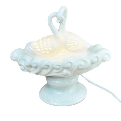 China Swan ceramic electric aroma essential oil wax melt burner for sale