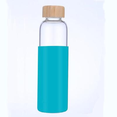 China Traditional glass bottle with silicone pouch for sale