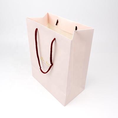 China Recycled Materials Custom Printed Logo Small Paper Shopping Bag With Rope Handle For Foods Gifts Packaging for sale