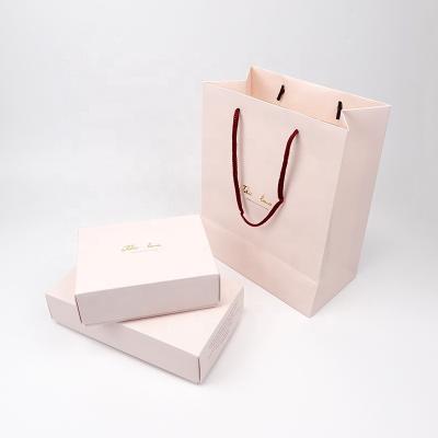 China Recycled Materials Fashion Custom Luxury Environmental Protection Pink Packaging Paper Bag for sale