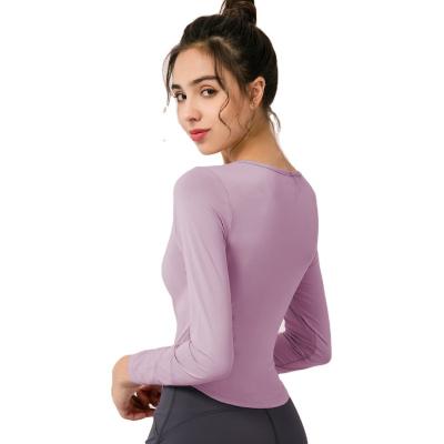 China New autumn and winter women's QUICK DRY yoga girdles long with chest pad sexy hollow tight tight fitness sports running clothes S-060 for sale