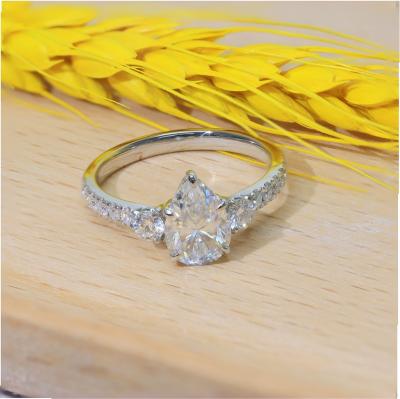 China FASHION TRENDY White Solid Moissanite Diamond Engagement Wedding Ring D Color 7x10mm Pear Moissanite Ring 10k White Gold for sale