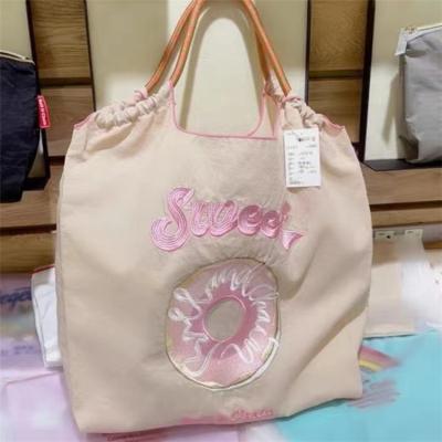 China 2022 Central Statistical Institute 2022 Embroidery Bag Letter Nylon Soft Ball Chain Handbag Large Eco-friendly Shopping Bag for sale