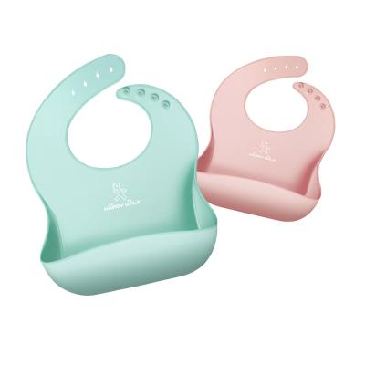 China Adjustable Hot Selling Amazon Toddler Feeding Silicone Waterproof Food Catcher Baby Bibs With Pouch OEM for sale