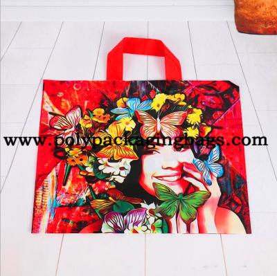 China Bolso de compras plástico cortado con tintas impresión multicolora de la manija en venta