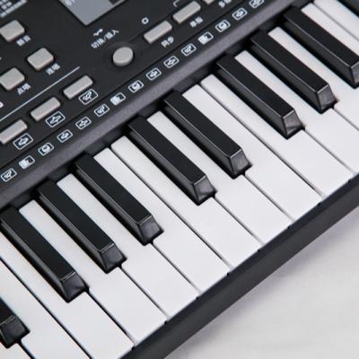 China ABS 61Key Keyboard Toy Musical Instrument Lighting Toy Digital Electronic Piano Organ Educational Colorful Gifts For Sale for sale