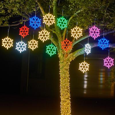 China Customized Snowflake Outdoor Garden Tree Decoration Tree Lamp LED Hanging Snowflake Pattern Waterproof Light for sale