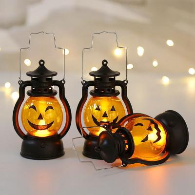 China A Halloween Party Supplies Lantern Lights 2022 Portable Flickering LED Candle Pumpkin Lamp Lantern For Halloween Party Decor for sale