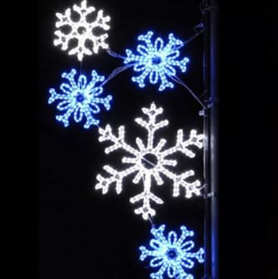 China Commercial Use Outdoor Festival Holidays Lighting Christmas Snowflake Decoration Led Poles Light LED Poles Mounted Pattern Lights for sale