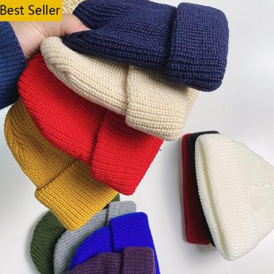 China COMMON HKS0001 white knitted acrylic skully girl custom pom bulk cashmere hat unisex winter fisherman beanie wholesale hats for sale