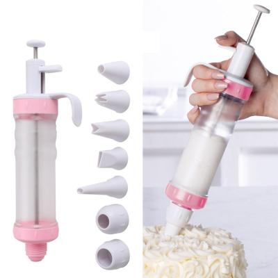 China Viable Wholesale Custom 7 Pcs Tips Kitchen Baking Press DIY Pink Plastic Decorating Mold Cookie Cake Spray Cream Gun for sale