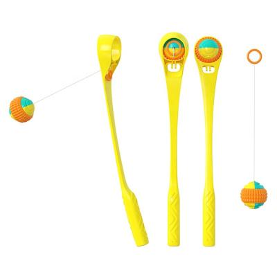 China Viable Pet Toys Dog Throwing Stick with Cord Ball Training Outdoor Pet Interactive Ball Thrower Toy for sale