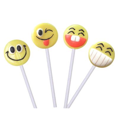 China Natural Fruit Flavor Decorated Smile Face Emots Lollipop Candy for sale