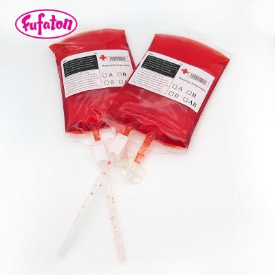 China Natural Fruity Red Colored Liquid Blood Drop Bag Candy And Sweets For Halloween for sale