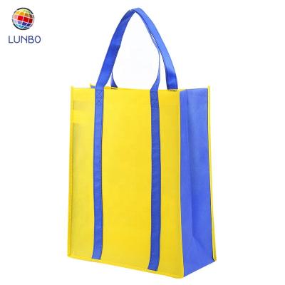 China High Quality Yellow 140gsm Non Woven Shopping Bag Bag With Long Handle At The Bottom for sale