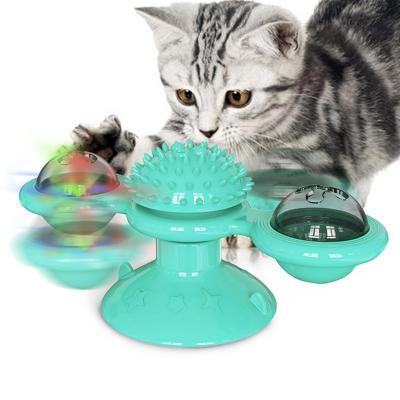 China Viable Rotating Ball Cat Windmill Toy Funny Massage Cat Toys With Catnip LED Teeth Cleaning Pet Products for sale