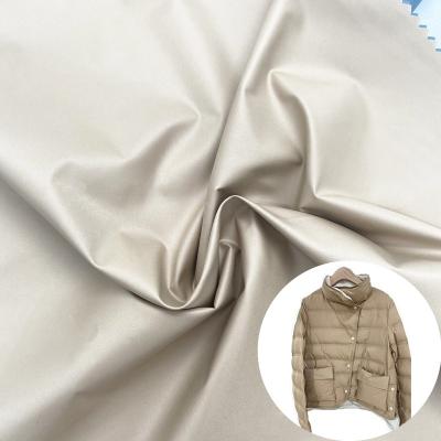 China Sustainable Custom Soft Handfeeling Light Up 100 Polyester 400T Pongee Fabric Matte For Down Jacket for sale