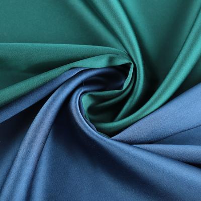 China Sustainable Wholesale Polyester Satin Silk Fabric High Elastic Textile For Pajamas Dress Garment for sale