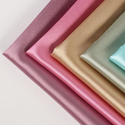 China Wholesale Viable Polyester Shiny Elastic Satin Silk Fabric For Shirt Outerwear for sale