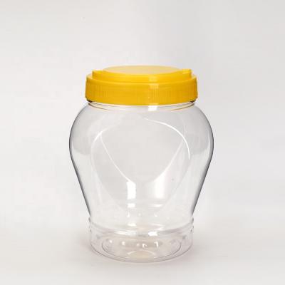 China Food Heart Shape Clear 1000ml PET Plastic Packaging Jar Container For Candy Cookie Foods Storage Jar for sale