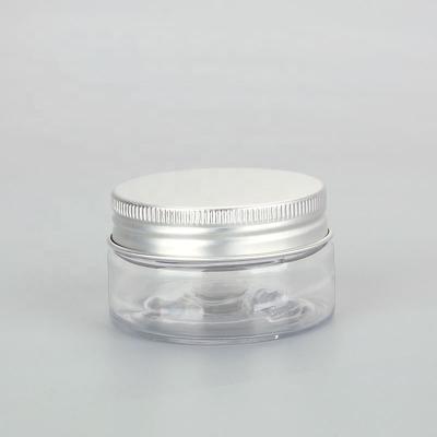 China Cosmetic 1 Ounce Plastic Jars Round Leak Proof Clear Plastic Container With Aluminum Silver Screw Lid for sale