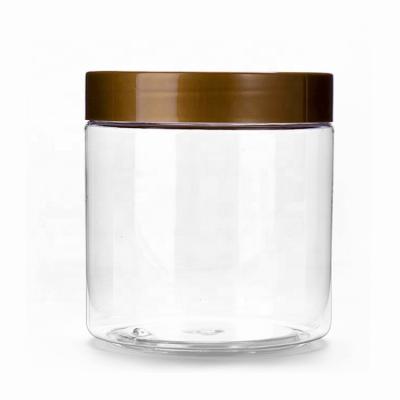 China Food Plastic Jars 32 oz Cylindrical Shape Clear PET Plastic With Black Smooth Lids for sale