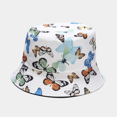 China Colorful Reversible Female Image Butterfly Pattern Bucket Hat Cotton Summer Outdoor Fisherman Hat for sale